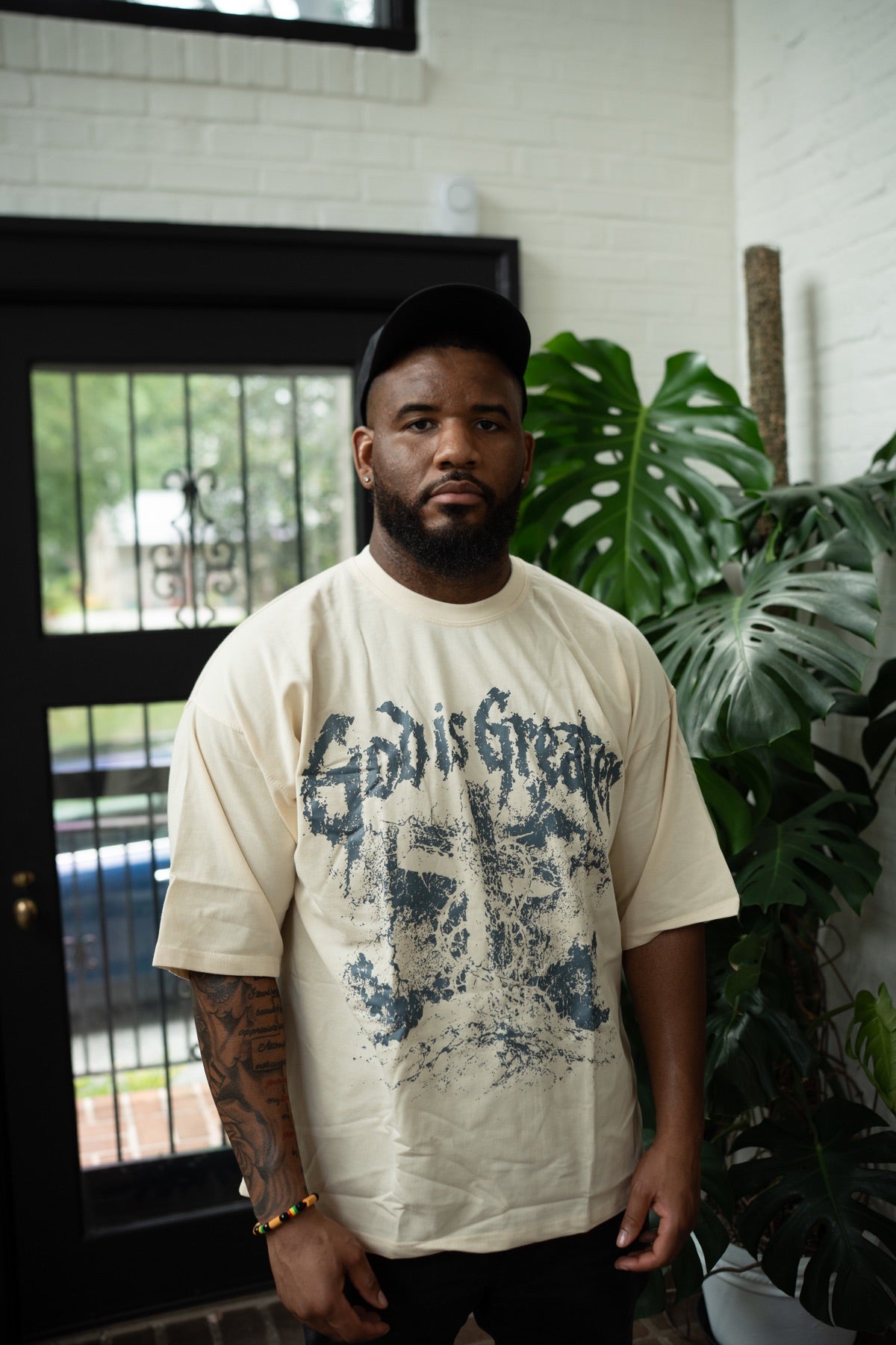 God Is Greater Tee - Cream authentic photo