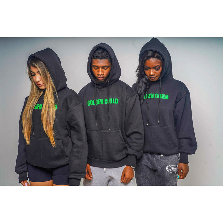 three people wearing black hoodies with a design that shows pictures of green skulls and a R3Birth logo on the back